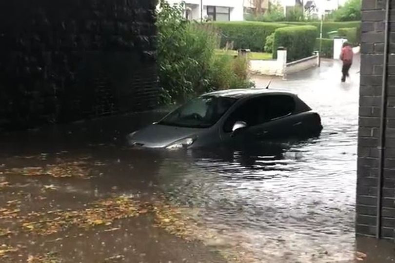 A car abandoned by its owners under Drumchapel railway bridge.