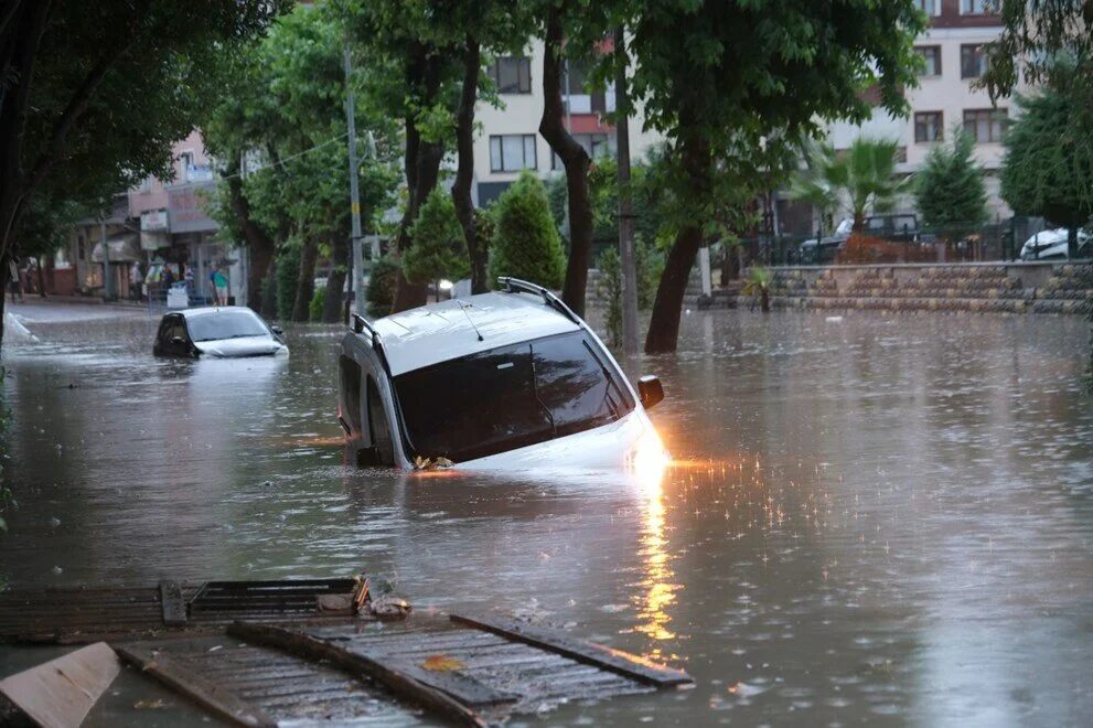 Cars trapped amid floodwaters in Bozkurt district, Kastamonu, northern Turkey, Aug. 10, 2021.