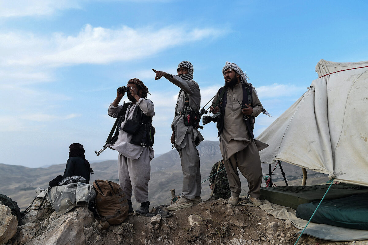 Click to enlarge Afghan militia fighters