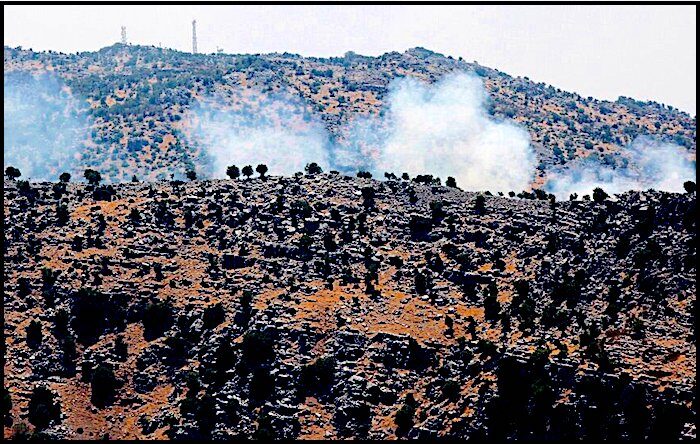 Click to enlarge Israeli shelling smoke
