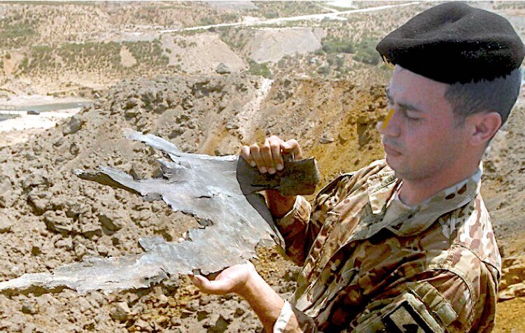 Click to enlarge soldier missile debris