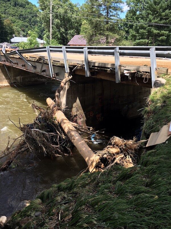 Officials said 10 to 15 bridges in Haywood County have been damaged or destroyed. This is a bridge in Cruso on the East Fork of Pigeon River, North Carolina,