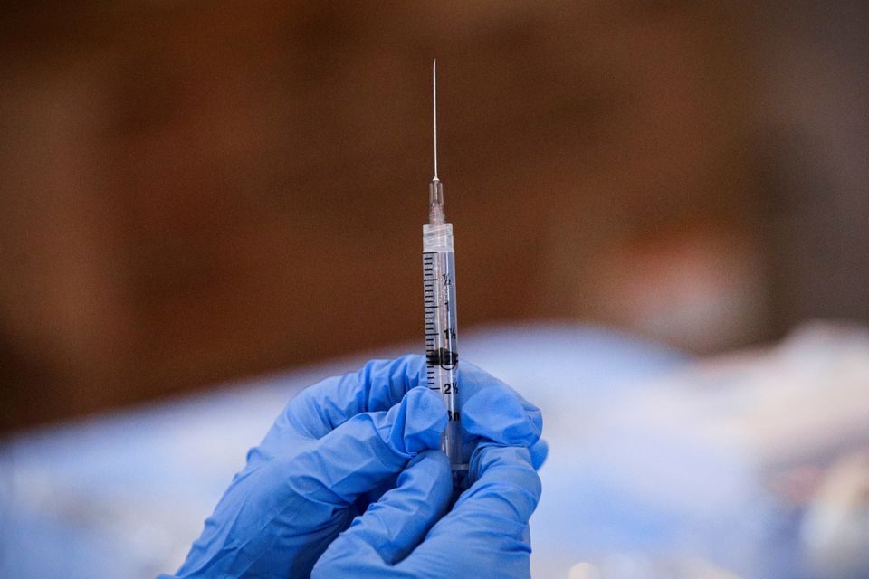 Click to enlarge syringe covid vaccine shot