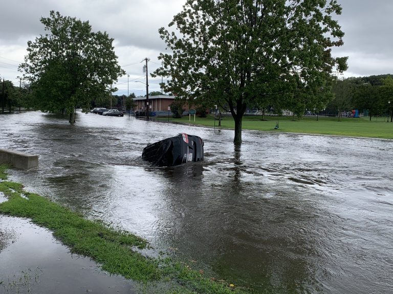 A car was swept away by floods in Newton MA. Newton MA Fire Dept said the vehicle was empty and no injuries were reported. Flooding damaged an estimated 120 hom