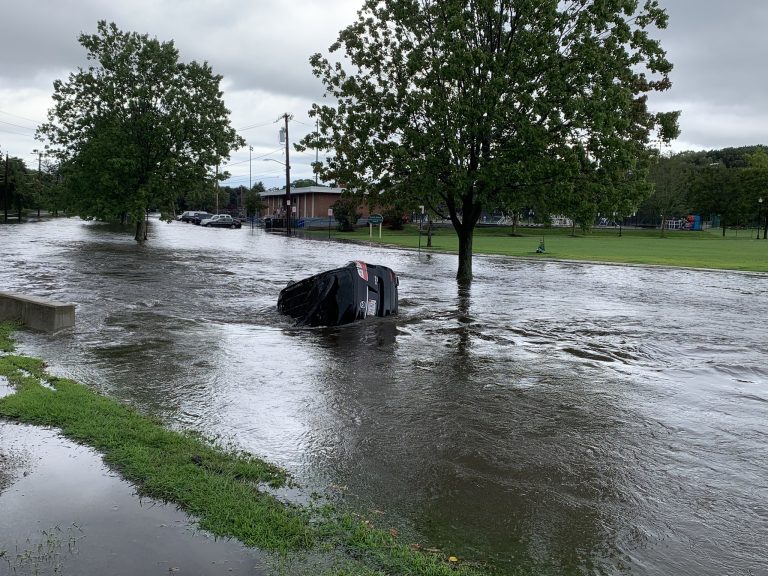 Click to enlarge A car was swept away by floods in Newton MA. Newton MA Fire Dept said the vehicle was empty and no injuries were reported. Flooding damaged an estimated 120 hom