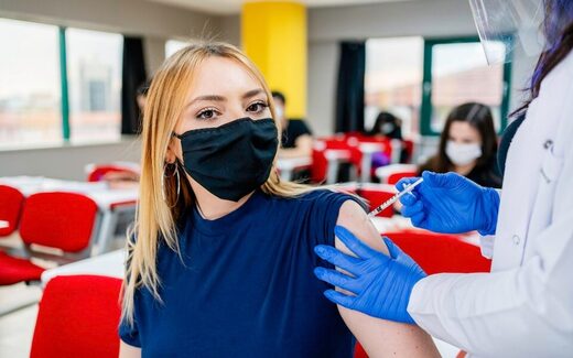student vaccine vaccinated young
