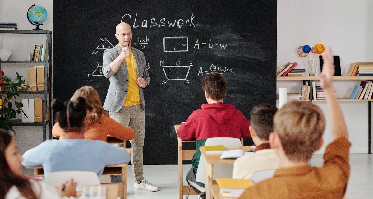 Click to enlarge teacher students classroom school