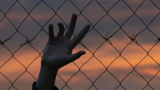 hand fence prison