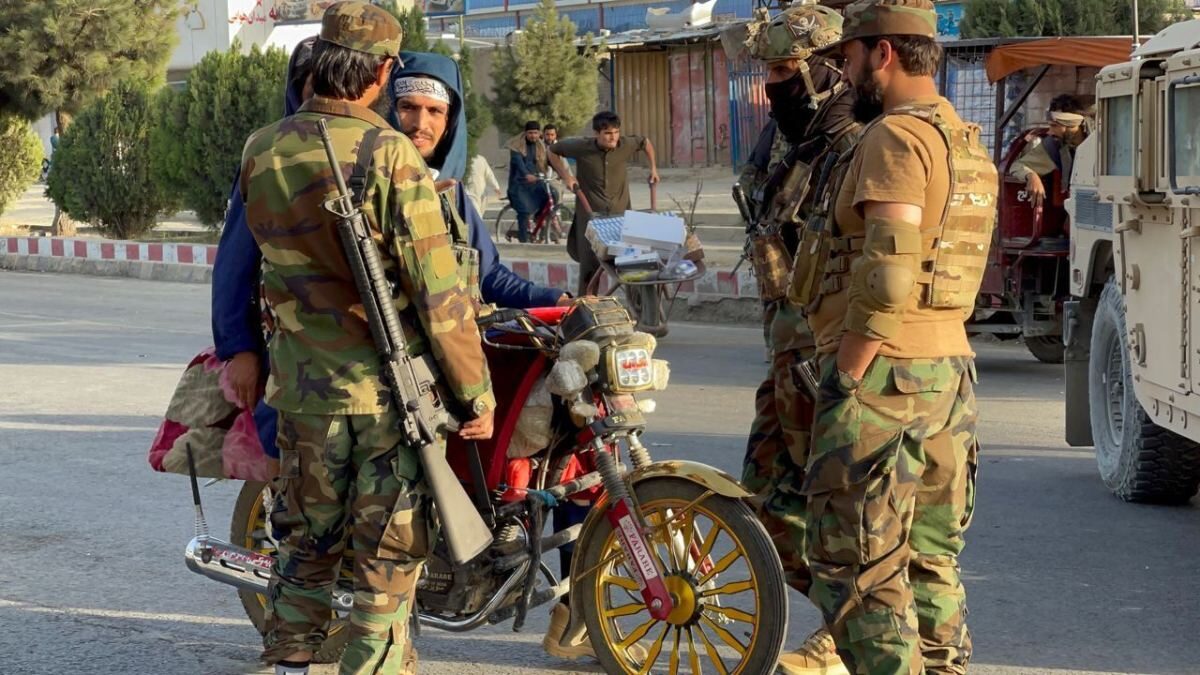 Click to enlarge Taliban members