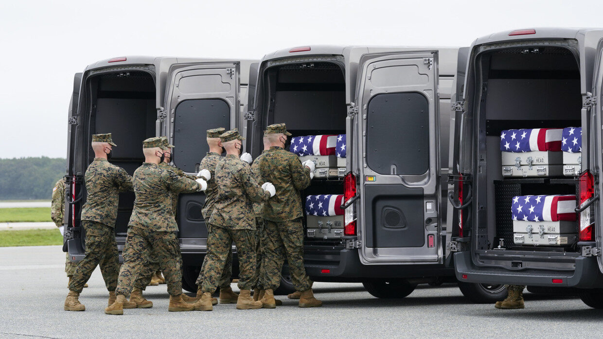 Click to enlarge kabul bombing casualties troops coffins