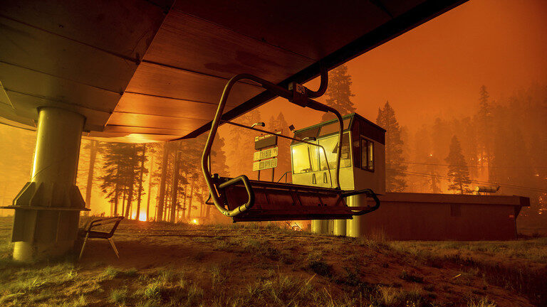The Caldor Fire burns at the Sierra-at-Tahoe ski resort in Eldorado National Forest, California, Monday, Aug. 30, 2021