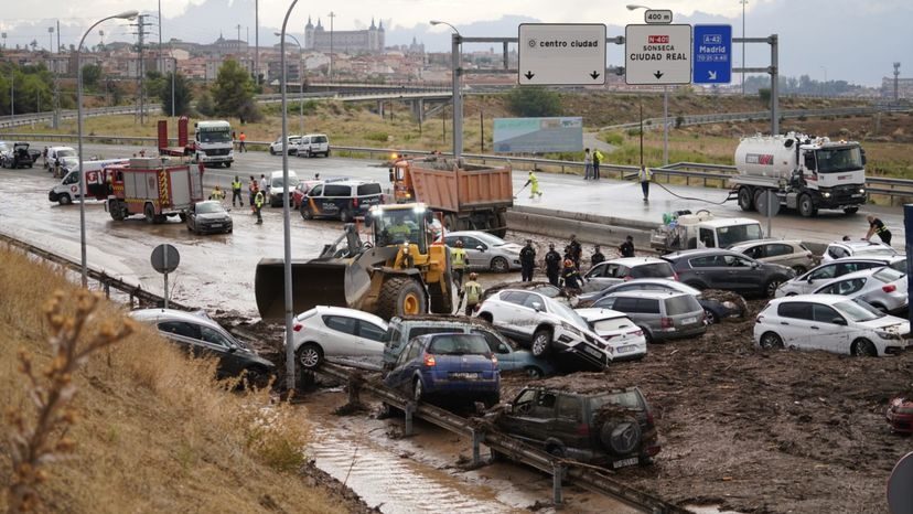 A pile-up of vehicles on a muddy road near Toledo.