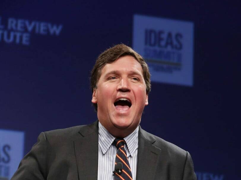tucker carlson laugh