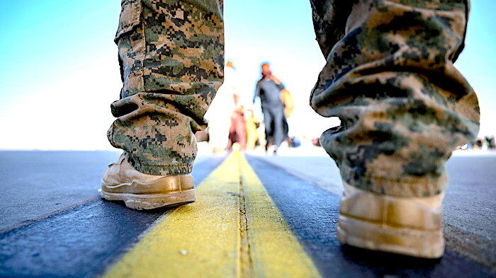 Click to enlarge US Marine and passengers
