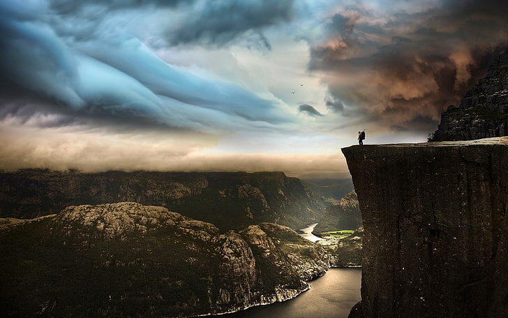 hiker cliff edge
