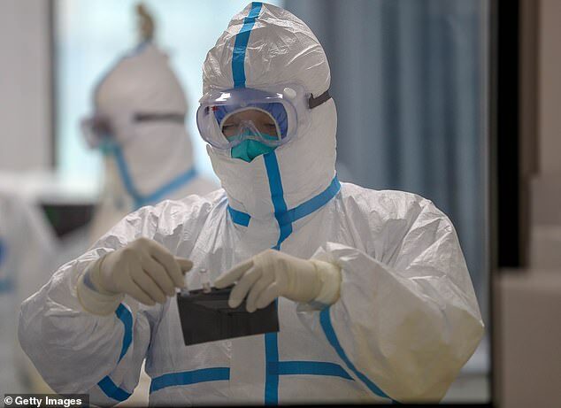 Click to enlarge wuhan lab worker hazmat suit covid