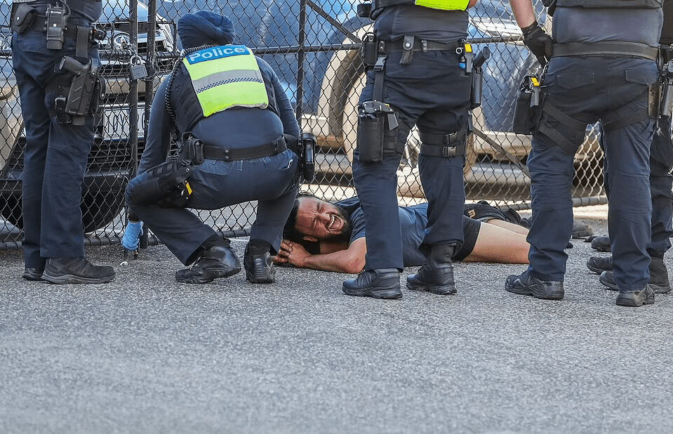 Click to enlarge Melbourne police protester arrest