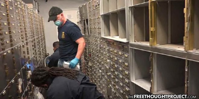 Click to enlarge A video screen capture taken from U.S. District Court documents show federal agents executing search and seizure warrants in late March at the U.S. Private Vaults store in Beverly Hills.(U.S. District Court)