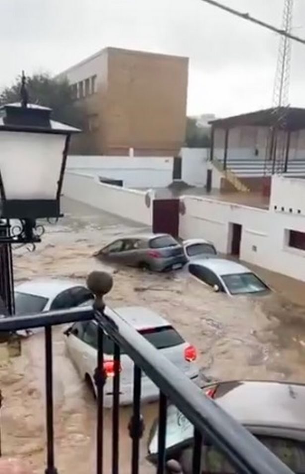 The flood water rising has resulted in devastating damage with numerous cars submerged or swept away