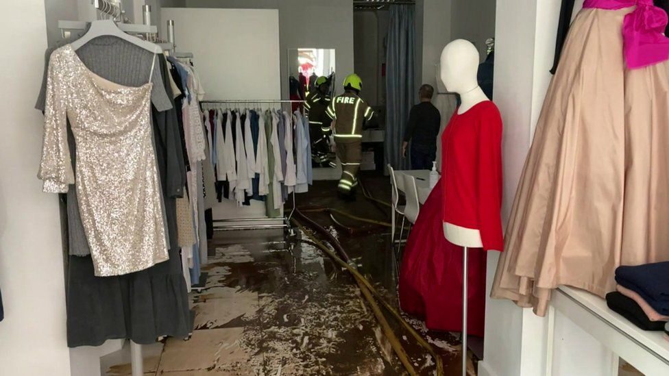 london dress shop flood damage