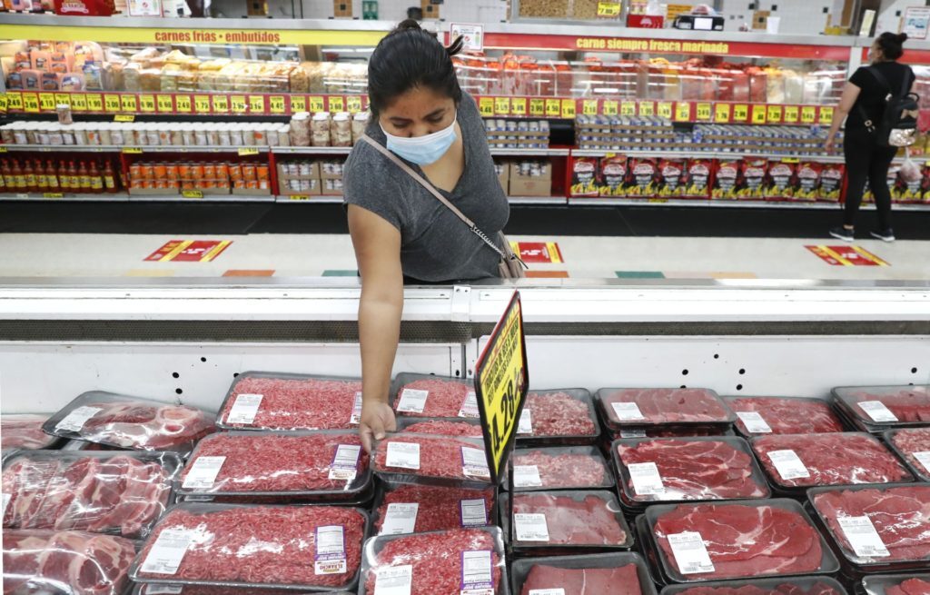 Click to enlarge woman shop meat grocery store