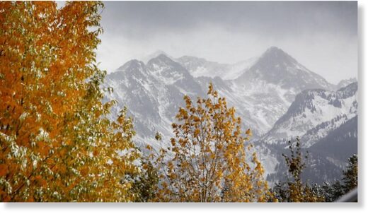 Clouds lift from the West Needles on Tuesday morning to reveal the snow-covered San Juan Mountains north of Durango.