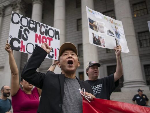 Click to enlarge Protest against COVID-19 vaccine mandates in New York.