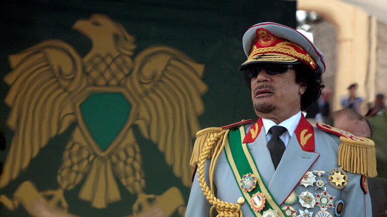 Click to enlarge Muammar Gaddafi