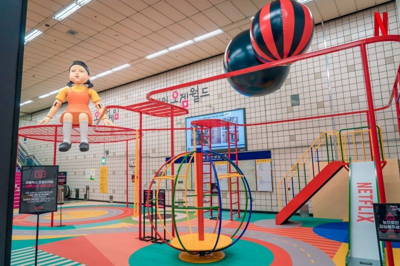 A Squid Game-themed playground in a train station in South Korea
