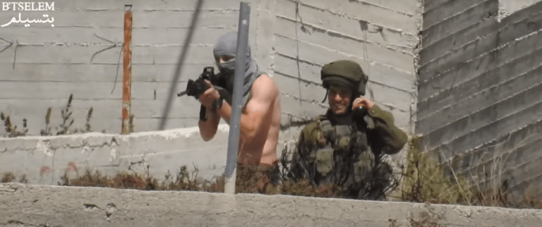 Click to enlarge israel settler gun soldier