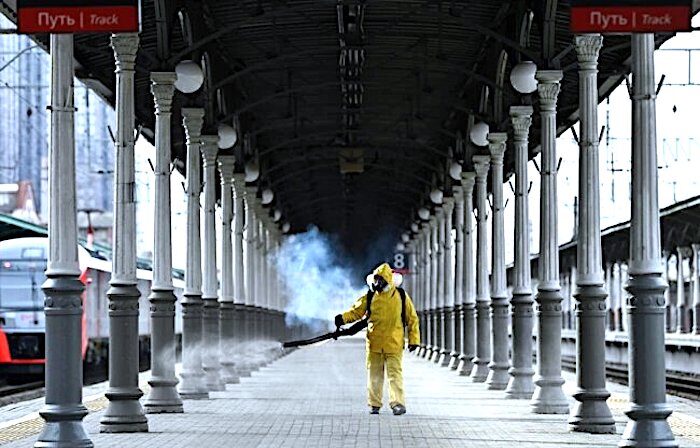Click to enlarge Spraying cement for virus