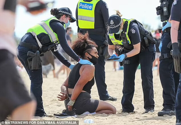 australia police beach arrest