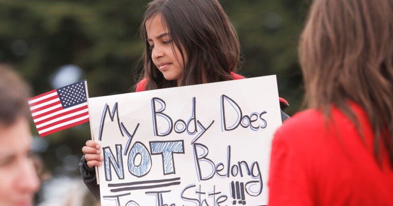 Click to enlarge child vaccine protest
