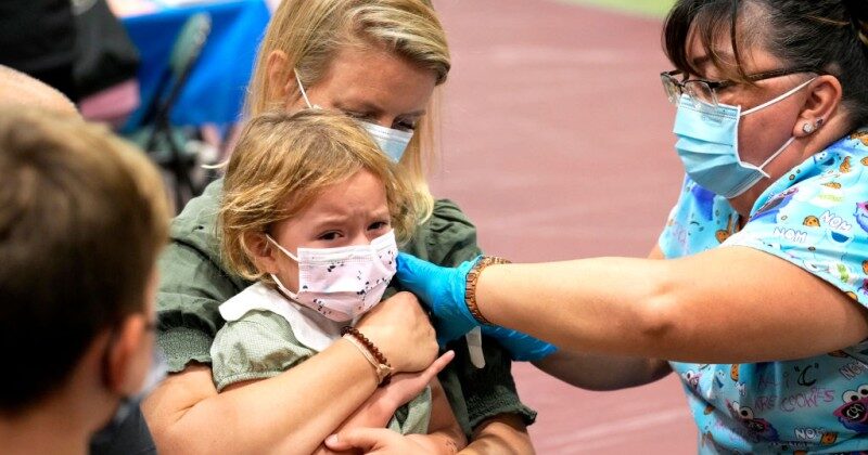 child being vaccinated children vaccination