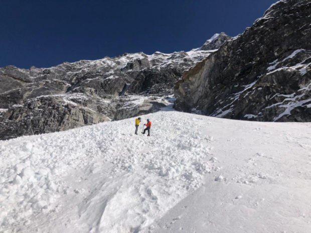 Search team members use probe devices to
