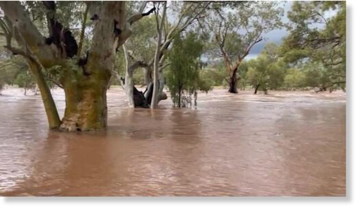 Usually Dry River Overflows During Record Rainfall in Alice Springs