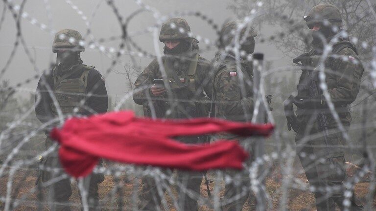 Click to enlarge Belarusian-Polish border migrant