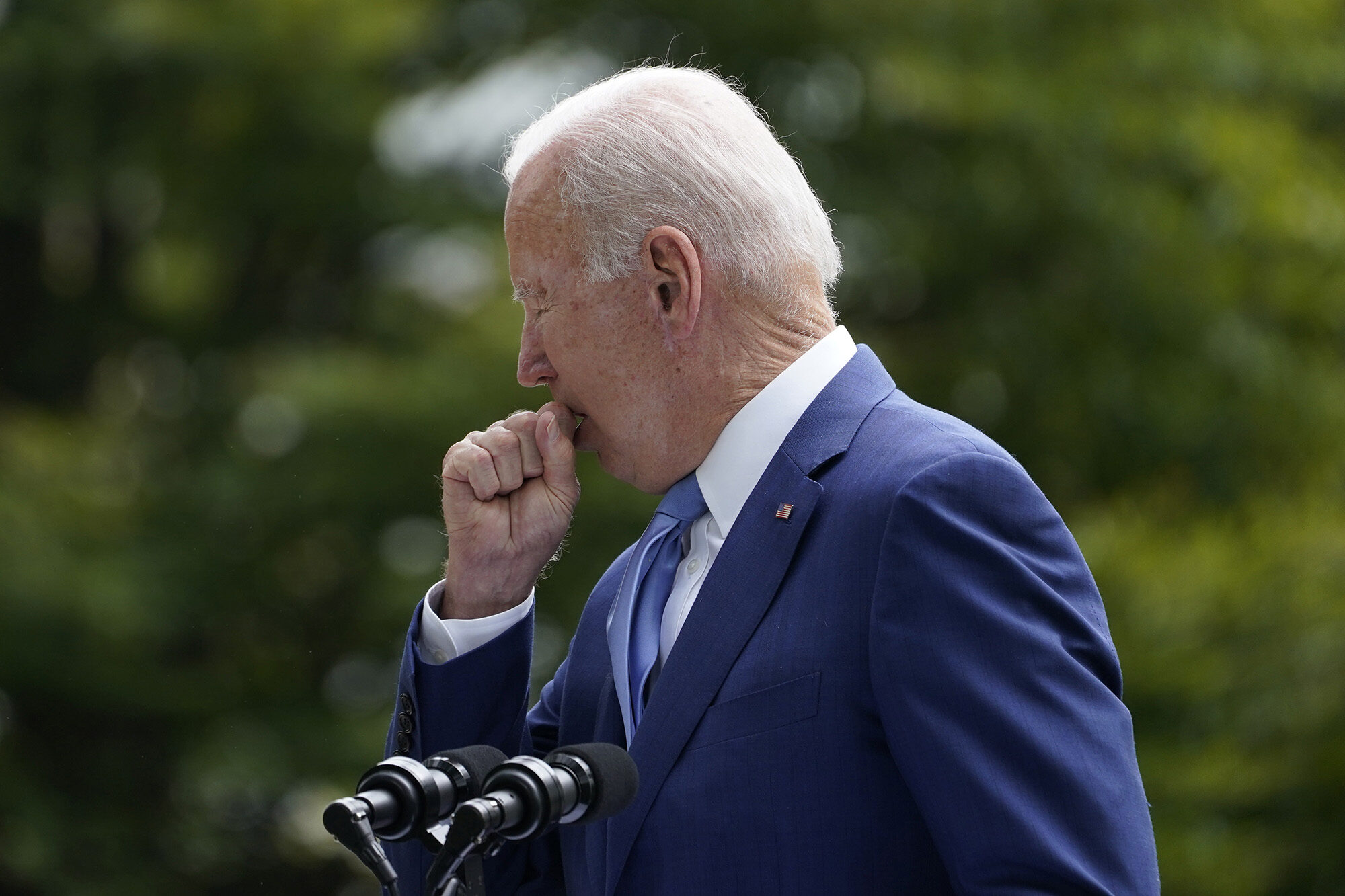 Click to enlarge Biden coughs
