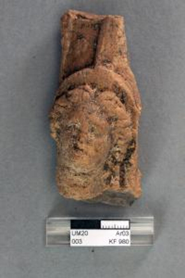 Head of terracotta statuette