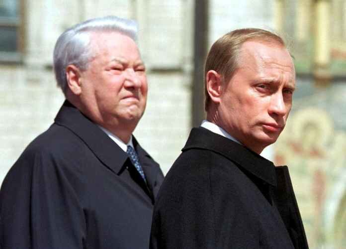 Click to enlarge Putin with Boris Yeltsin