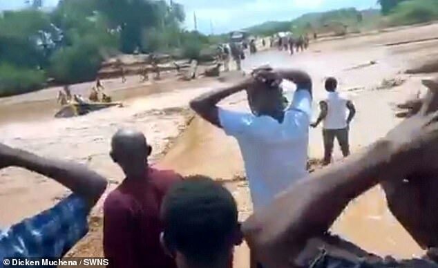More than 20 people died after a bus was washed away by a violent flood in Kenya