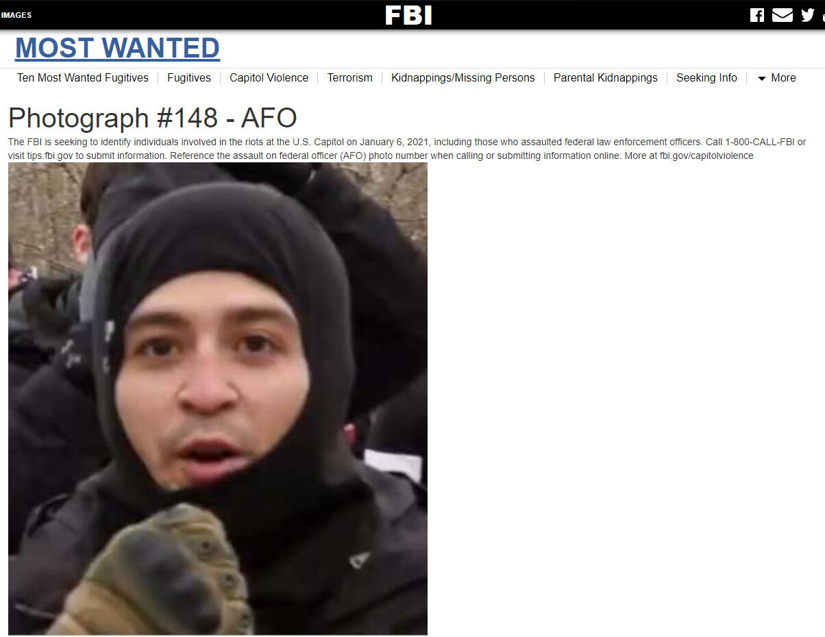 Click to enlarge black ski mask man fbi suspect capitol hill riot