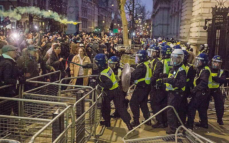 Click to enlarge riots covid downing street britain