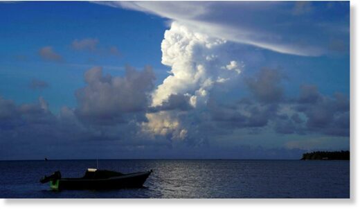 White gaseous clouds rise from the Hunga Ha'apai eruption, seen from near Tonga's capital Nuku'alofa