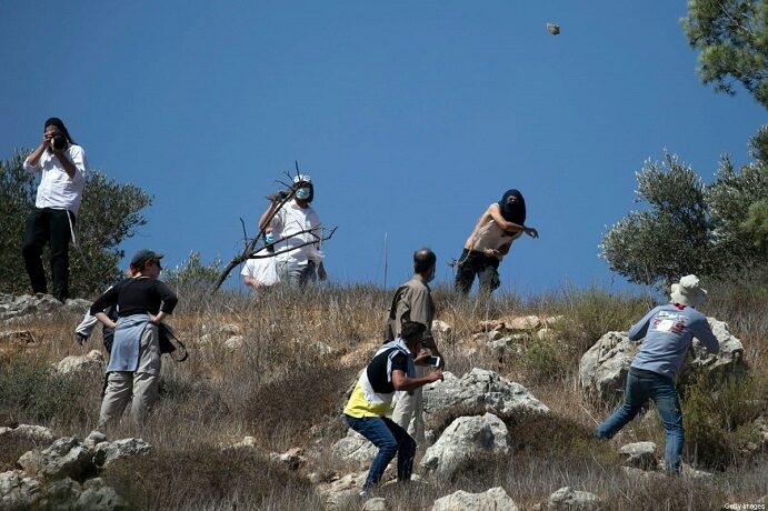 israeli settlers attack palestinians