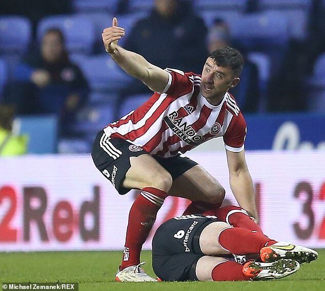 footballer collapse pitch covid vaccine