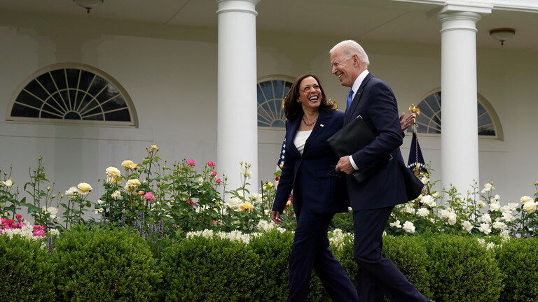 Click to enlarge biden harris walking laughing