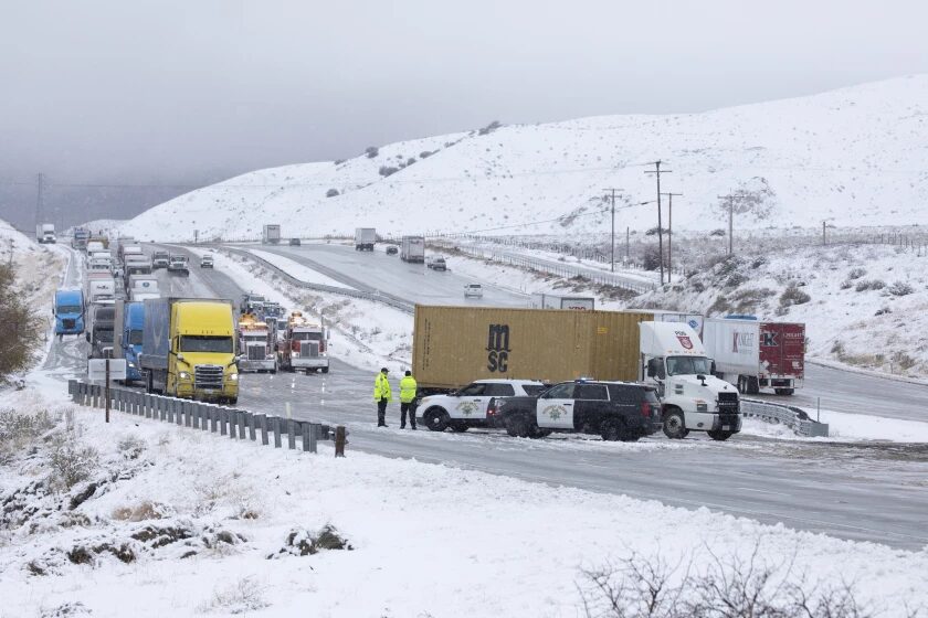 Click to enlarge Traffic is turned around on the northbound 5 Freeway just before Gorman as a cold storm brought snow to parts of the Southland and closed the freeway through the Grapevine.