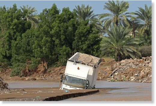 A vehicle is trapped by floodwater after the tropical Cyclone Shaheen in Al Khaburah city in Al Batinah on October 4, 2021