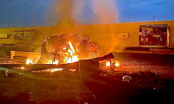 Click to enlarge Burning wreckage